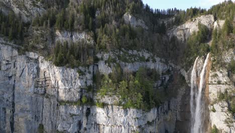 Aerial-Of-Seerenbach-Falls,-Switzerland-waterfall-cascade-in-Amden