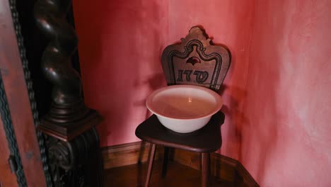 Vintage-washbasin-setup-in-a-Baroque-room-at-Trakoscan-Castle,-Croatia