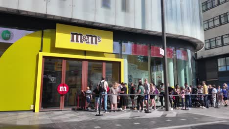People-Queuing-To-Enter-The-M-And-M's-Store-In-Leicester-Square-In-The-Morning