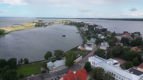 Aerial-dolly-shot-over-city-of-Haapsalu-on-Baltic-Sea-coast-of-Estonia