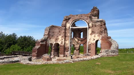 The-red-church-near-the-city-of-Perushtitsa-against-the-blue-sky