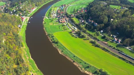 View-Of-Elbe-River-With-Settlements-Down-The-Rock-Massif-Of-Bastei-In-National-Park-Sächsische-Schweiz,-Germany