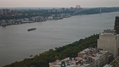 NYC-New-York-Aerial-v244-flyover-Morningside-Heights-Upper-Manhattan-capturing-traffic-on-Henry-Hudson-Parkway-along-Hudson-river-and-Harlem-cityscape-views---Shot-with-Inspire-3-8k---September-2023