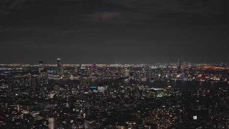 NYC-New-York-Aerial-v180-panning-view-drone-flyover-East-village-capturing-night-cityscape-of-Lower-Manhattan-with-towering-skyscrapers-and-World-Trade-Center---Shot-with-Inspire-3-8k---September-2023