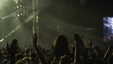 Audience-dancing-in-slow-motion-at-a-concert