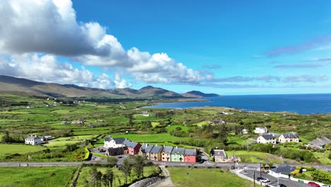Drone-view-Eries-Village-tourist-destination-on-the-Wild-Atlantic-Way-in-West-Cork-Ireland-colourful-village-in-stunning-surroundings-on-a-sunny-summer-morning