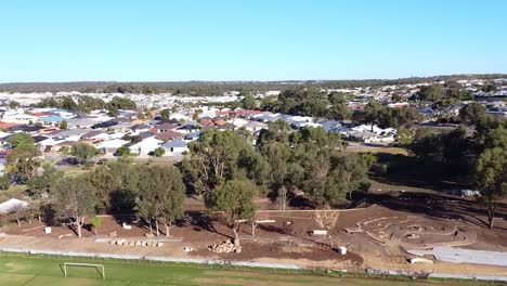 Forward-aerial-view-towards-Riverlinks-Park-all-abilities-playground-construction-after-flooding