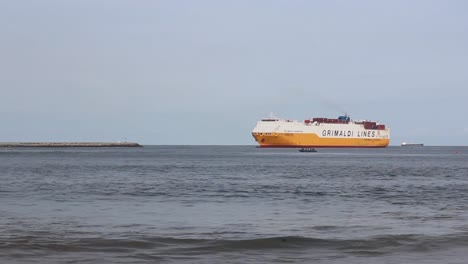 Grimaldi-containers-ship-enters-Nigeria-port-at-Apapa,-Lagos-through-Lagos-water-inlet-near-Eko-Atlantic-city-and-Tarkwa-bay-laden-with-cargo