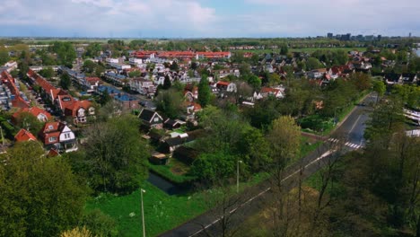 Amsterdam-Noord-residential-suburb-district-drone-aerial-during-sunny-spring