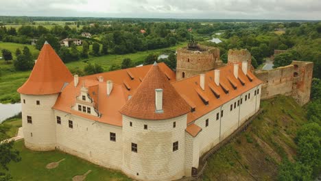 Aerial-shot-of-the-palace-built-next-to-the-old-Bauskas-castle,-in-latvia