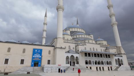 Ankara,-Türkiye:-Exterior-view-of-Kocatepe-Mosque-in-Ankara,-showcasing-its-impressive-architecture-and-serene-surroundings