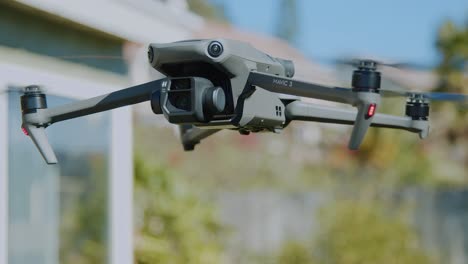 Still-close-up-shot-of-a-brand-new-dji-mavic-3-being-steady-in-the-air