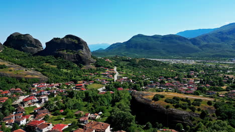 Aerial-Drone-Fly-The-Meteora-rock-formation-at-Greece-village-natural-landscape