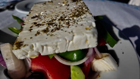 Delicious-Greek-salad-with-feta-on-top,-close-up-view
