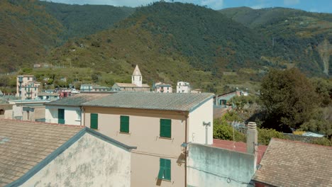 Cinque-Terre-Corniglia-Panoramic-View-with-Houses,-Coast,-Clouds,-Horizon,-Vacation,-Blue-Sky,-Italy