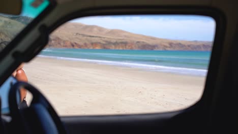 A-young-couple-walking-on-a-beautiful-white-sand-beach-in-the-fleurieu-peninsula,-South-Australia