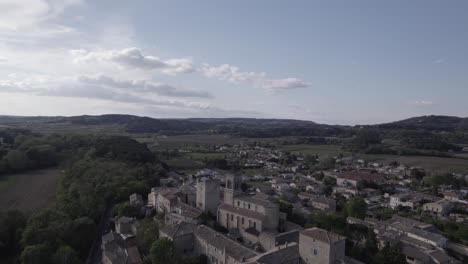 Aerial-establishing-shot-overhead-the-historic-city-of-Tresques-in-France