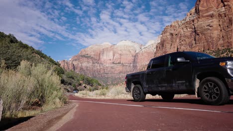 Cars-making-their-way-down-the-scenic-drive-route-in-Zion-National-Park