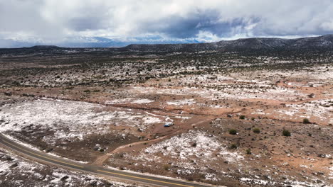 Motorhomes-Parked-Over-Semi-Arid-Terrain-Near-Utah,-United-States