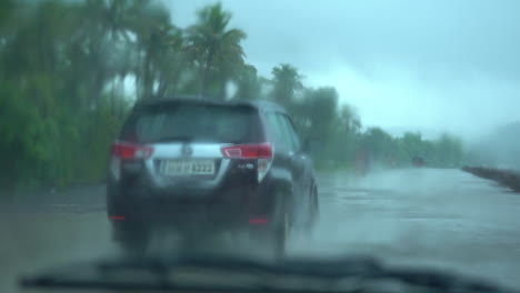 a-car-travelling-in-rain-Toyota