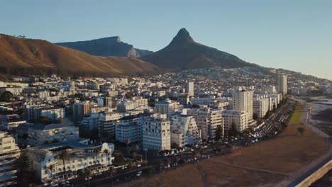 Scenic-drone-flying-over-the-skyline-of-Cape-Town-South-Africa-in-sunset