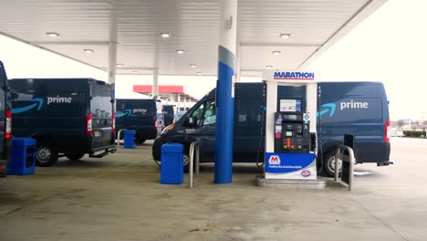 Amazons-at-gas-station-filling-up-gas-tanks-with-fuel