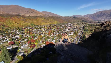 Beautiful-Autumn,-fall-season-scene-of-young-traveler-on-lookout