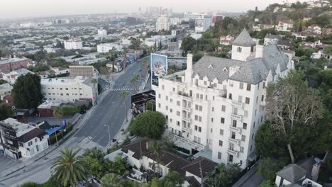Orbiting-around-the-famous-Chateau-Marmont-hotel-on-Sunset-Boulevard,-LA,-USA