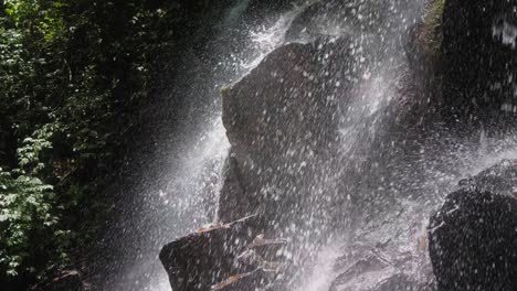 beautifully-illuminated-Kanto-Lampo-Waterfall-in-Bali,-Indonesia