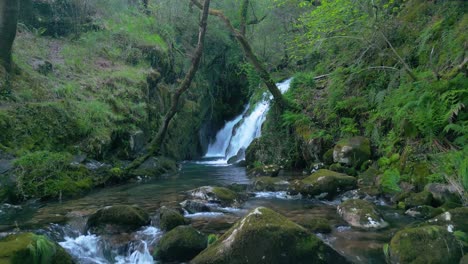 Small-Waterfalls-Flowing-On-The-Mossy-Rock-Mountains-In-Santa-Leocadia-Near-Mazaricos-In-Galicia-Spain
