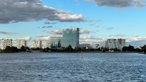 Burswood-Crown-Casino-Perth-across-Swan-River-with-blue-sky-puffy-clouds