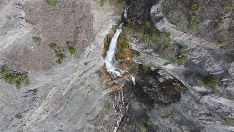 Aerial-view-above-lower-Bridal-Veil-Falls-in-American-Fork-Canyon,-Utah-during-spring