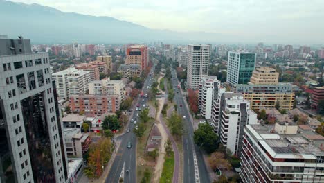 Las-Condes-Santiago-de-Chile-Neighborhood-Aerial-Panoramic-Traffic-Architecture-Skyline-Background-with-Andean-Cordillera-at-daylight