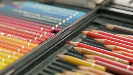 Close-up-of-colorful-pencils-in-a-case,-focusing-on-a-vibrant-palette-of-art-supplies
