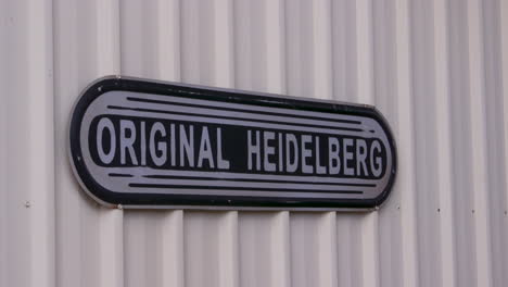 Logotipo-Y-Letrero-Originales-De-La-Máquina-De-Impresión-Heidelberg.-Alemania