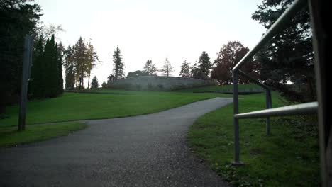 Cullen-Gardens-Footpath-in-Whitby-with-a-Panning-Shot-in-Slow-Motion,-Canada