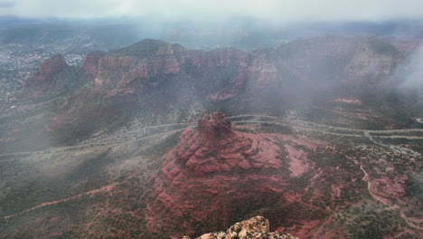 Aerial-View-Of-Bell-Rock-Butte-On-A-Misty-Day-In-Sedona,-Arizona,-USA