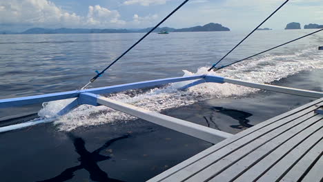 Slow-Motion,-Balangay-Traditional-Filipino-Catamaran-Boat-Sailing-Between-Island,-Passenger-POV