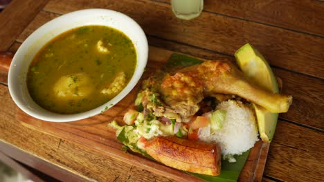 Colombian-Sancocho-Soup-Served-with-Chicken,-Rice,-Salad-and-Avocado