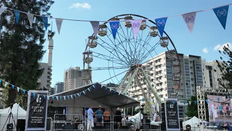 Stage-competition-and-show-at-the-48th-Paniyiri-Greek-festival-with-stage-and-Ferris-wheel-in-the-background