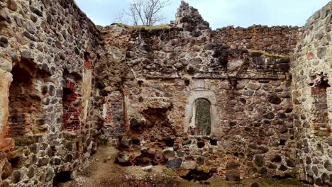 Revealing-drone-shows-Latvian-historic-castle-ruins-Ruana,-remains-cultural-spot