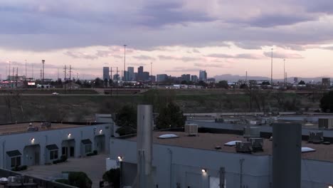 Aerial-footage-of-Denver,-Colorado,-during-dusk-hours-north-of-Denver-Taken-from-south-Thornton,-Colorado