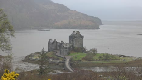 Static-wide-angle-shot-of-an-observational-point-overlooking-Eilean-Donan-Castle