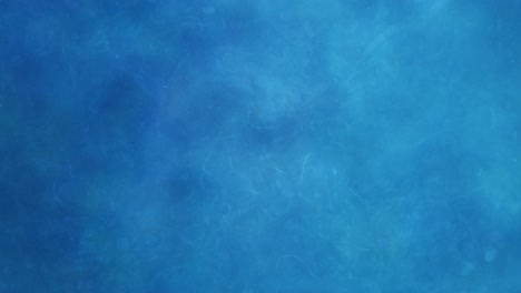 Türkisfarbene-Wellen-In-Abstrakter-Bewegung---Fließende-Wellen-Und-Wirbelnde-Muster-In-Aquamarinblauer-Wonne,-Die-Einen-Faszinierenden-Blauen-Unterwasserhintergrund-Erzeugen