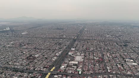 Streets-and-avenues-of-Ecatepec-from-above,-suburbs-of-Mexico-City