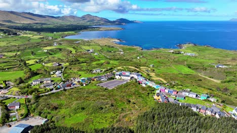 Drone-landscape-the-stunning-landscape-of-the-Beara-Peninsula-in-West-Cork-Ireland,colourful-Eyreies-village-ablaze-of-vibrant-colour-in-a-beautiful-landscape