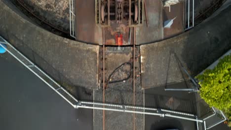 Aerial-of-a-vintage-railway-station-in-Whitehead,-Northern-Ireland