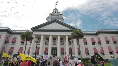 Wide-angle-view-of-a-crowd-standing-in-front-of-the-Florida-State-Capitol-at-a-Free-Our-Patriots-rally-in-Tallahassee,-FL-for-editorial-use