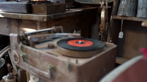 Ancient-isolated-Greek-artifact-disc-record-player-close-up