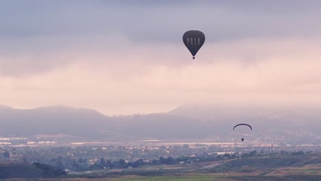 Temecula-Balloon-and-Wine-Festival-Drone-View-of-Pala-Hot-Air-Balloon-and-a-Paraglider